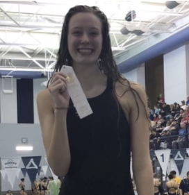 Swimmer backstrokes towards teamwork