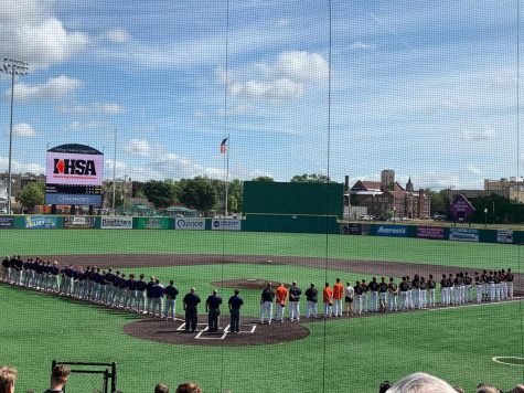 Bengals stand with Rockton Hononegah Community High School
pledging allegiance before the semi-final morning game on June 19.