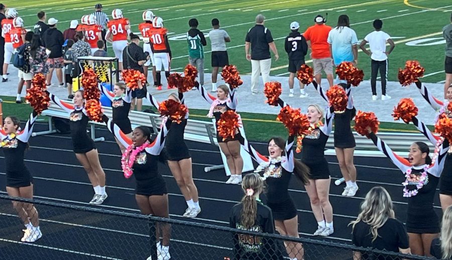 Plainfield East cheer supports their football team on Sep. 8th against Oswego East High School.