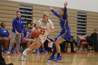 Lexi Sepulveda drives with the ball at a home game against Joliet Central on Nov. 30, creating an exciting atmosphere that girls athletics at PEHS as a whole embodies. PEHS won 85-60.