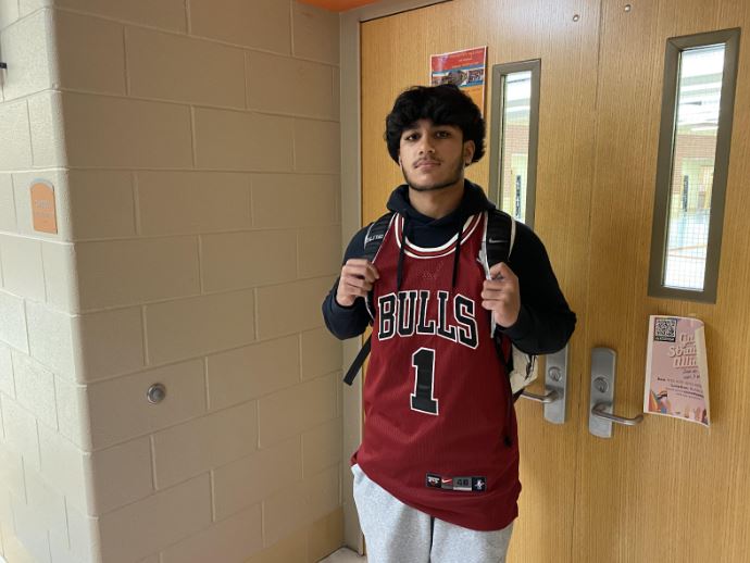 Zahid Sameer Jaweed, senior, wears a Derrick Rose jersey to school Sept. 26 to honor Rose’s retirement.

