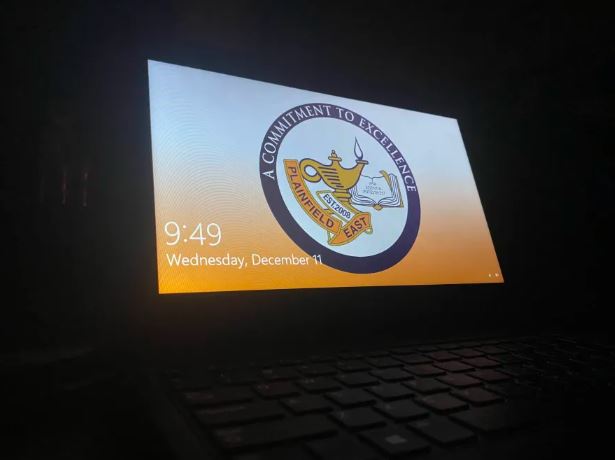 Plainfield East district issued laptop displaying the time 9:49 p.m. on Dec. 11.