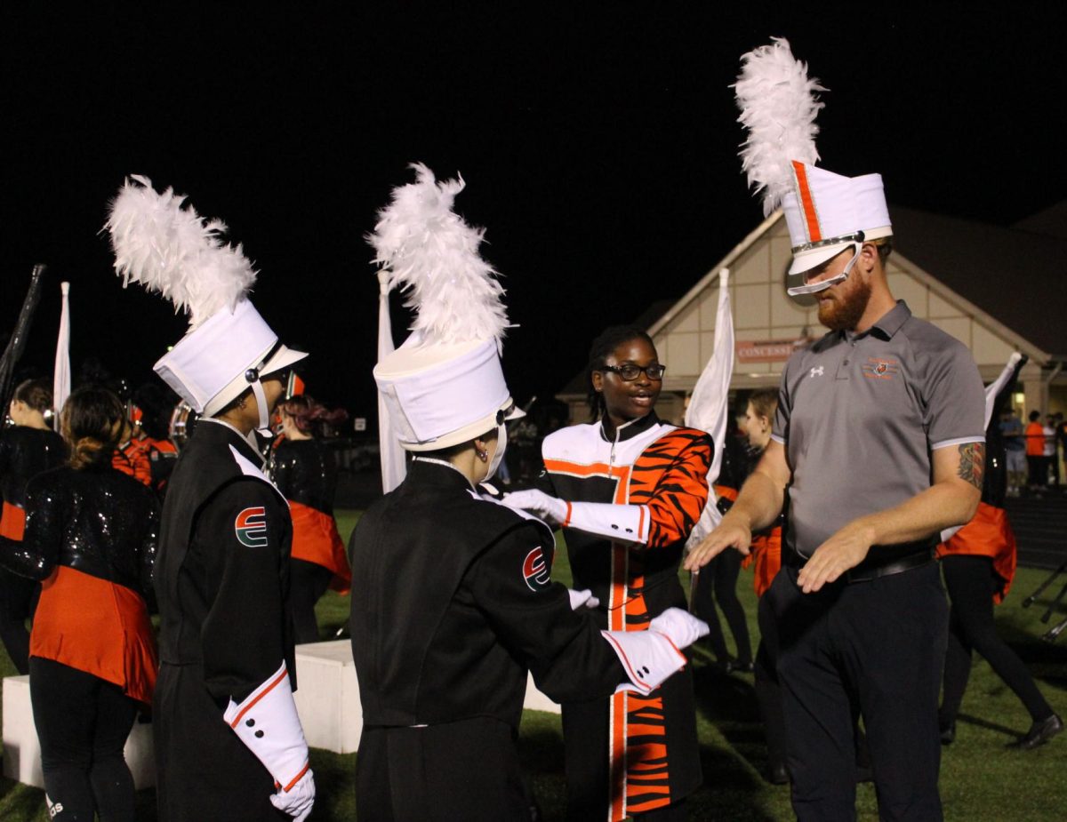 School Dean Tries Hand at Marching Band