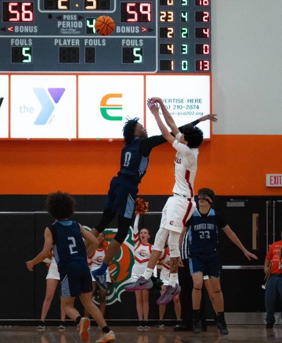 Plainfield East number one KJ Miller rises up from beyond the arc to force overtime with 4.7 seconds remaining in the fourth quarter.