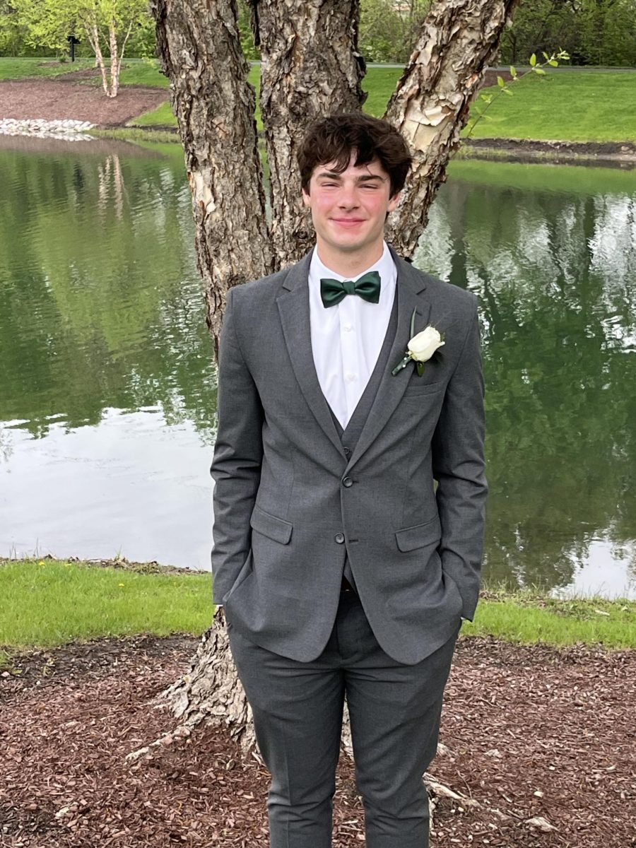 Nathan Meyer poses for prom photos.